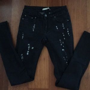 CHRISTIAN AUDIGIER distressed black jeans